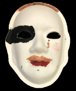 Unmasking Brain Injury mask painted with brown and black