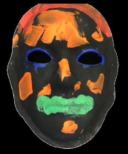 Unmasking Brain Injury mask painted black with orange and green