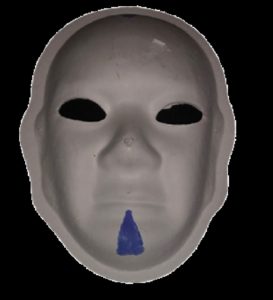Unmasking Brain Injury mask painted with a blue triangle on the chin