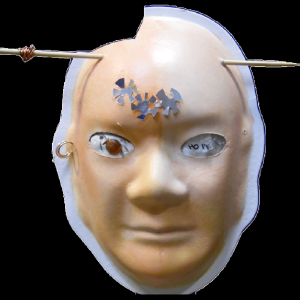 Unmasking Brain Injury mask painted with facial features