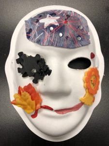 Unmasking Brain Injury mask with collaged images and text
