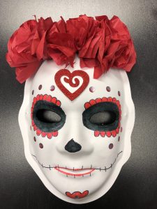 Unmasking Brain Injury mask painted like a dia de los muertos mask