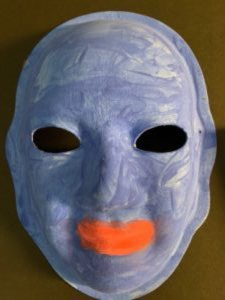 Unmasking Brain Injury mask painted blue with orange lips