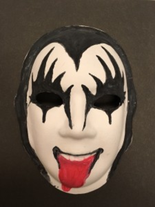 Unmasking Brain Injury mask painted like a KISS mask