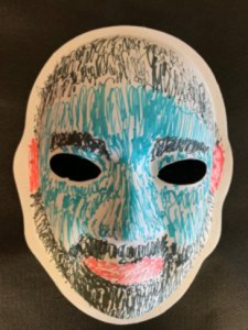 Unmasking Brain Injury mask colored in black, blue and red